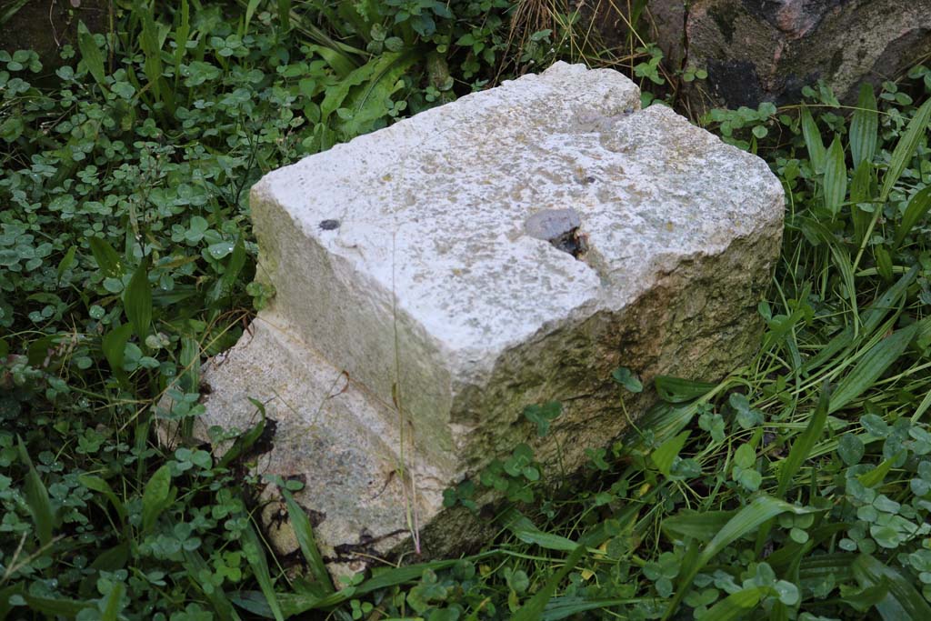 I.14.12, Pompeii. December 2018. Base? of triclinium table.  Photo courtesy of Aude Durand.