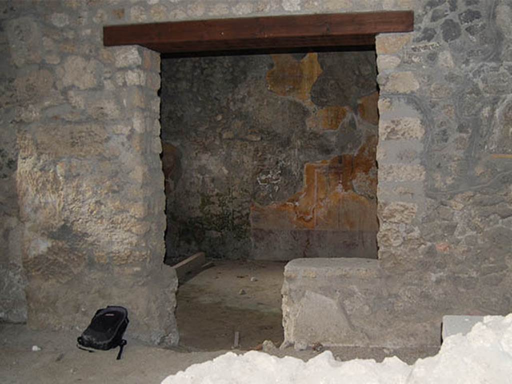 I.14.15 Pompeii. October 2013. Doorway to room on west side of bar-room. Photo courtesy of Paula Lock.
