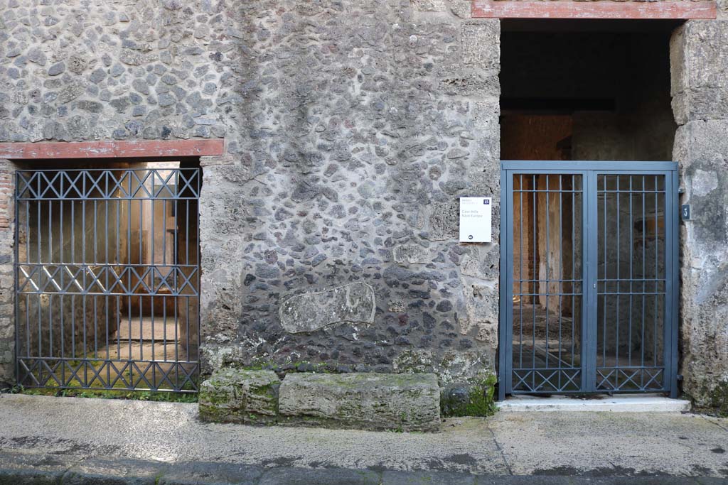 I.15.2 Pompeii, on left. December 2018. 
Looking south towards entrance doorways, with I.15.3, on right. Photo courtesy of Aude Durand.
