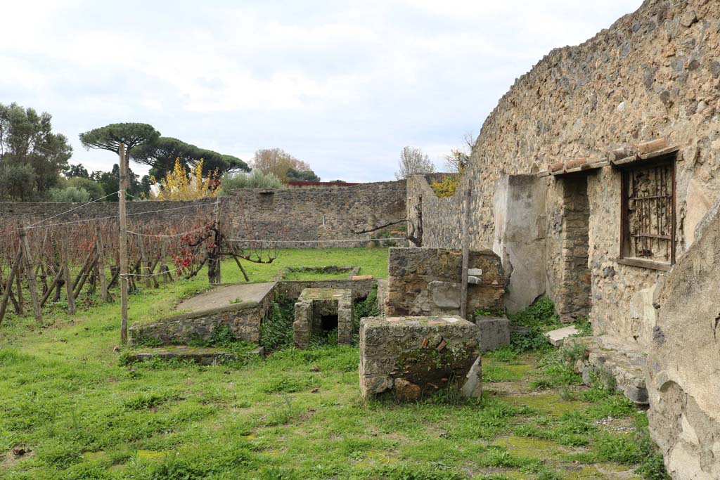 I.20.1 Pompeii. December 2018. Looking west towards triclinium, the doorway on the right is from I.20.2. Photo courtesy of Aude Durand.

