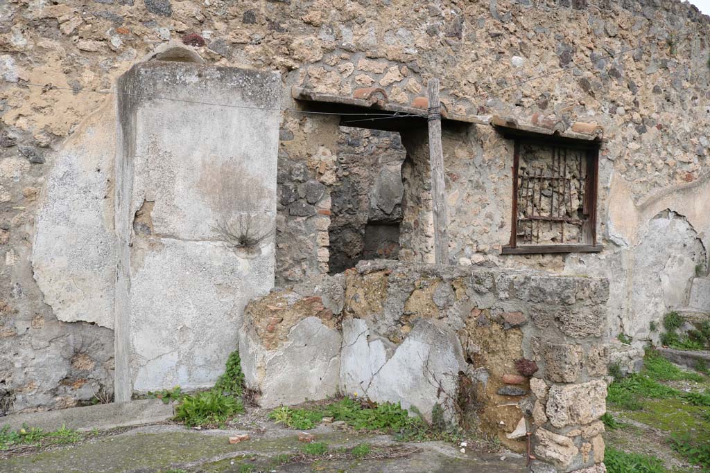 I.20.1 Pompeii. December 2018. Rear of wall on north side of triclinium, looking north-east. Photo courtesy of Aude Durand.