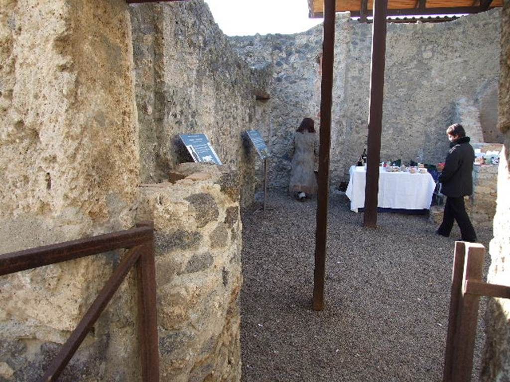 I.20.3 Pompeii. December 2006. Looking west into rear room, from I.20.2.  