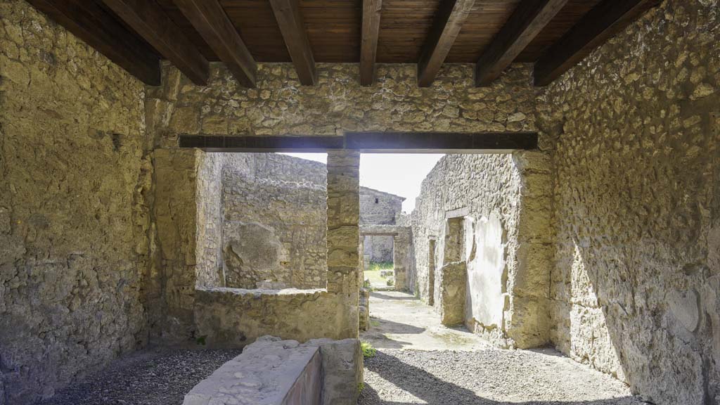 II.1.1 Pompeii. August 2021. Looking south towards rear and II.1.13. Photo courtesy of Robert Hanson.