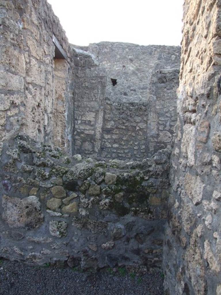 II.1.2 Pompeii.  December 2007.   Looking west into small cubiculum over adjoining wall from II.1.3.
