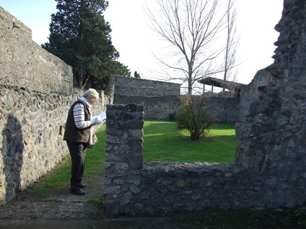 II.1.6 Pompeii. December 2007.  South wall of rear room with large window and doorway into garden of II.1.7.
