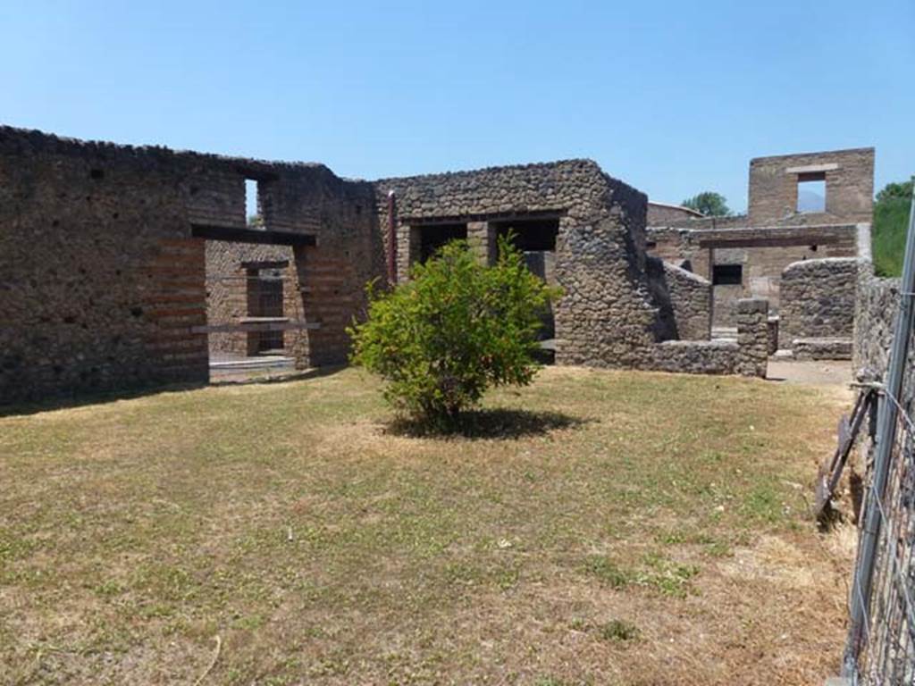 II.1.7 Pompeii. June 2012. Looking north-west across garden, from side entrance doorway. Photo courtesy of Michael Binns.