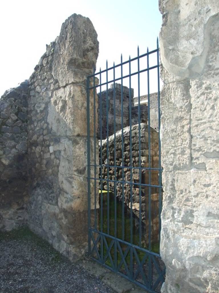 II.2.2 Pompeii.  March 2009.  North west corner of atrium, with door to II.2.1