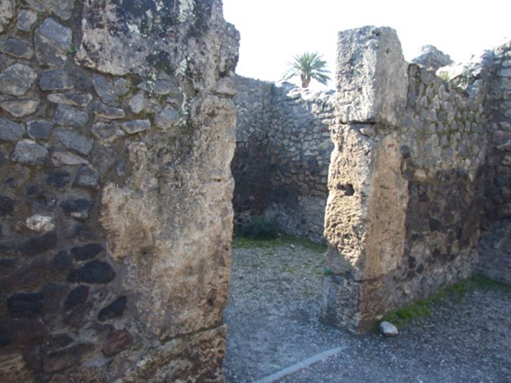 II.2.2 Pompeii.  March 2009.  Door to room 4, Triclinium, on west side of atrium.