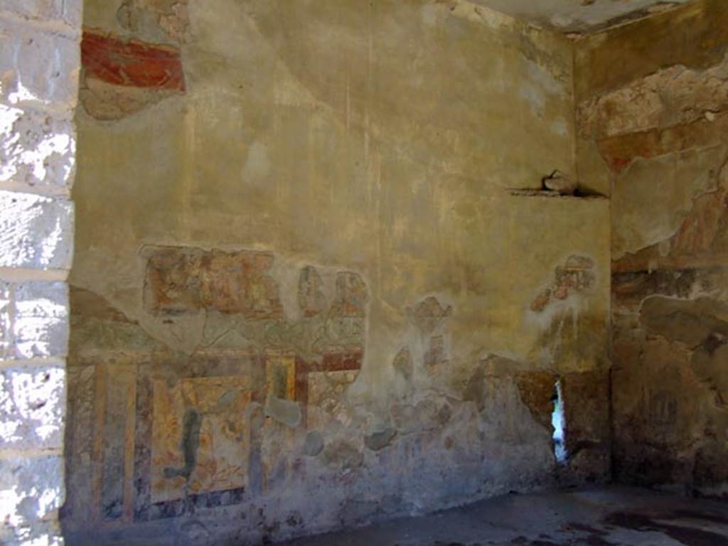 II.2.2 Pompeii. March 2009. Room “h”, north wall of triclinium. In the narrow frieze above the marbled band are scenes from the Iliad. Left to right: Patrocles fighting on a wagon and with the arms of Achilles, with the inscriptions XANTUS, BADIUS and PATROCLOS 
Thetis gives the weapons to her son; Automedon readies the chariot: with the inscriptions THETIS, BADIUS, ACHiLL[e]S and AUTO[me]DON
At the east end is The body of Hector being dragged by the chariot. With the inscriptions [hect]OR and AUTOMEDON
See Della Corte in Maiuri, A., 1928. Nuovi Scavi nella Via dell’Abbondanza. Milano: Hoepli. (p. 111-2).