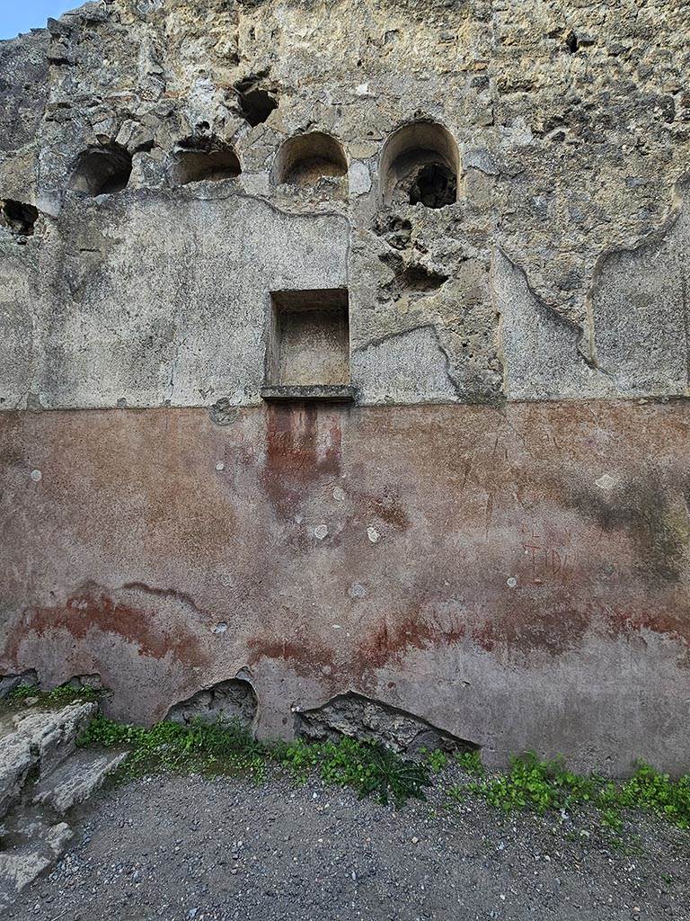 II.2.3 Pompeii. November 2024. 
South end of west wall of bar-room, with niches. Photo courtesy of Annette Haug.
