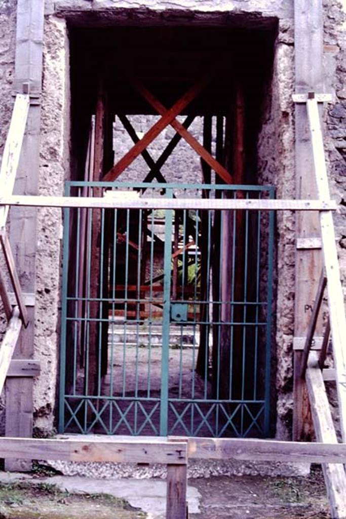 II.3.3 Pompeii, 1982 or 1983. Looking towards entrance doorway on south side of Via dell’Abbondanza.   
Source: The Wilhelmina and Stanley A. Jashemski archive in the University of Maryland Library, Special Collections (See collection page) and made available under the Creative Commons Attribution-Non Commercial License v.4. See Licence and use details. J80f0461
