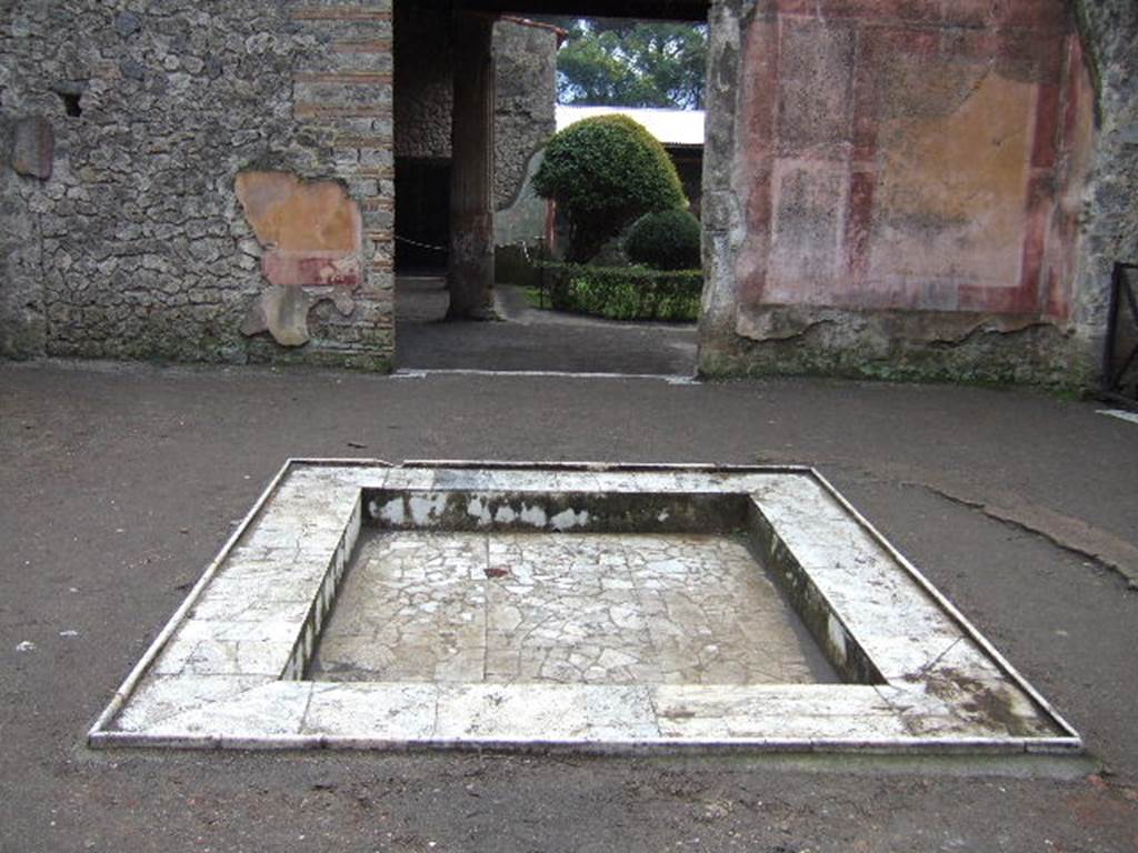 II.3.3 Pompeii. December 2004. Room 2, atrium. Looking south across impluvium.