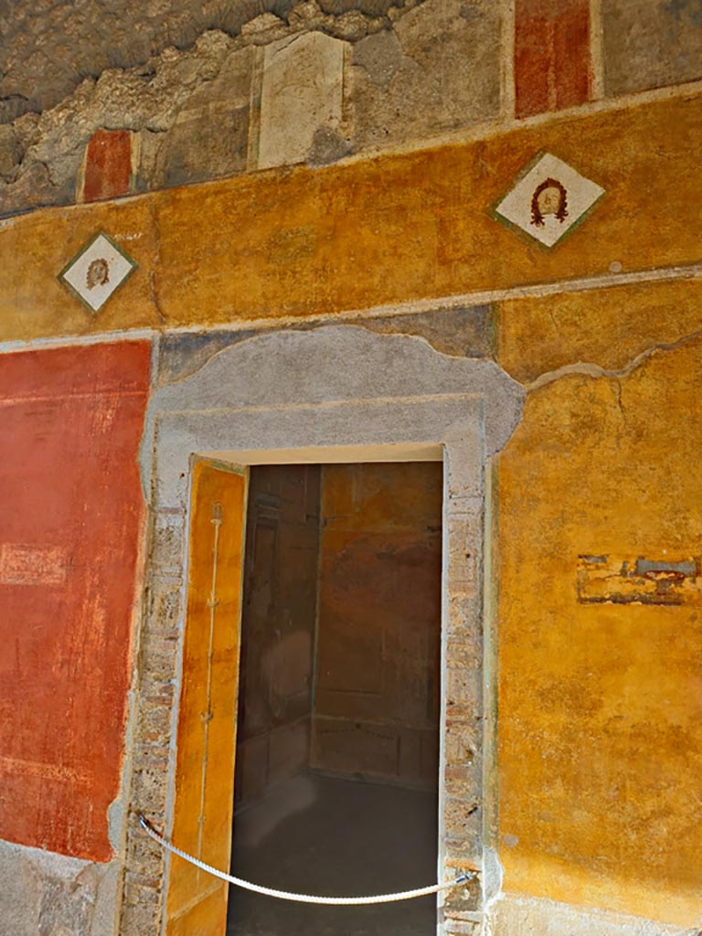 II.3.3 Pompeii. March 2024. 
Room 11, north end of upper west wall of west portico, above doorway to room 12. Photo courtesy of Giuseppe Ciaramella.
