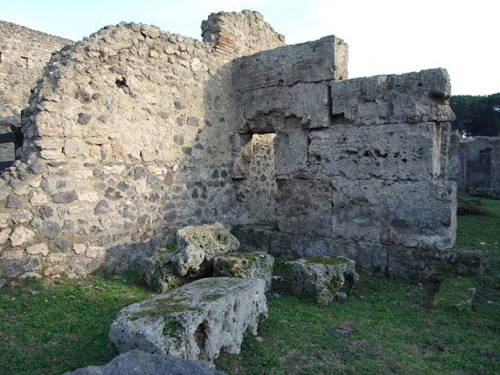 II.3.5 Pompeii. December 2007.  South-east corner of bar room with doorway into small room or cupboard.