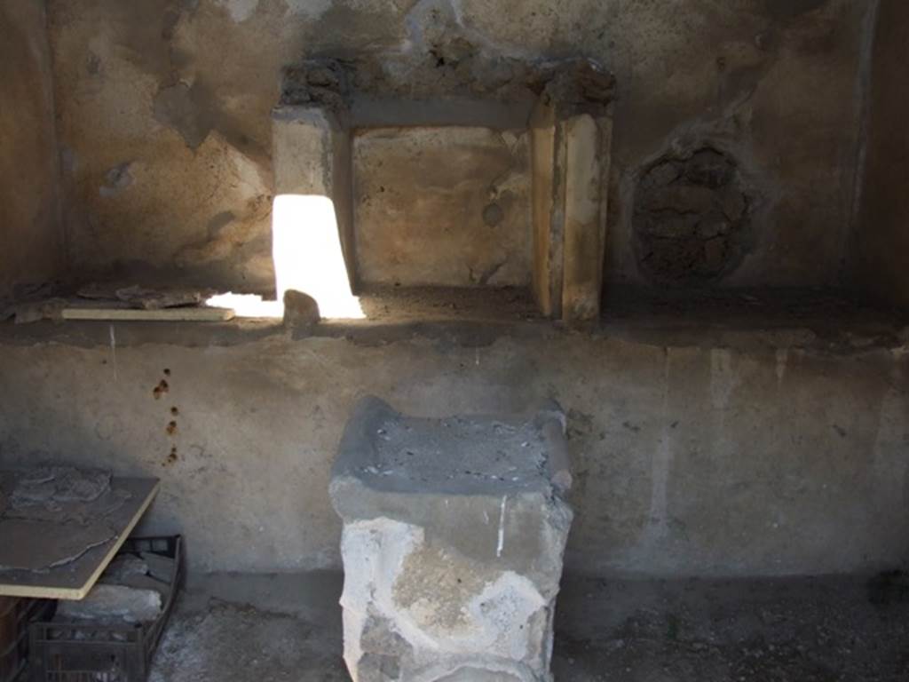 II.3.6 Pompeii.  March 2009.  Sacellum.  Remains of aedicula Lararium built against the north wall with altar below.

