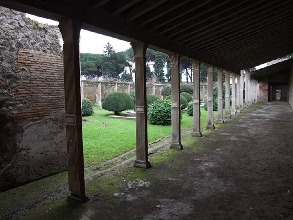 II.4.3 Pompeii. December 2006. Looking south east  across garden, from west portico
