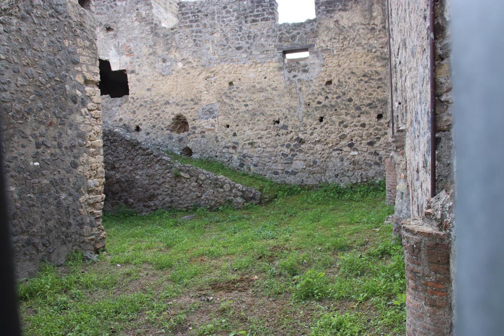 II.4.4 Pompeii. October 2022. Looking towards south wall from entrance doorway, with ramp. Photo courtesy of Klaus Heese

