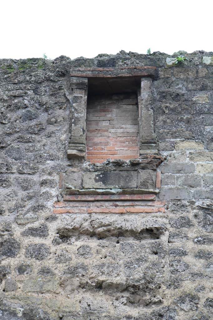 II.4.6 Pompeii. December 2018. 
Niche/recess on upper front façade on left of entrance doorway. Photo courtesy of Aude Durand.

