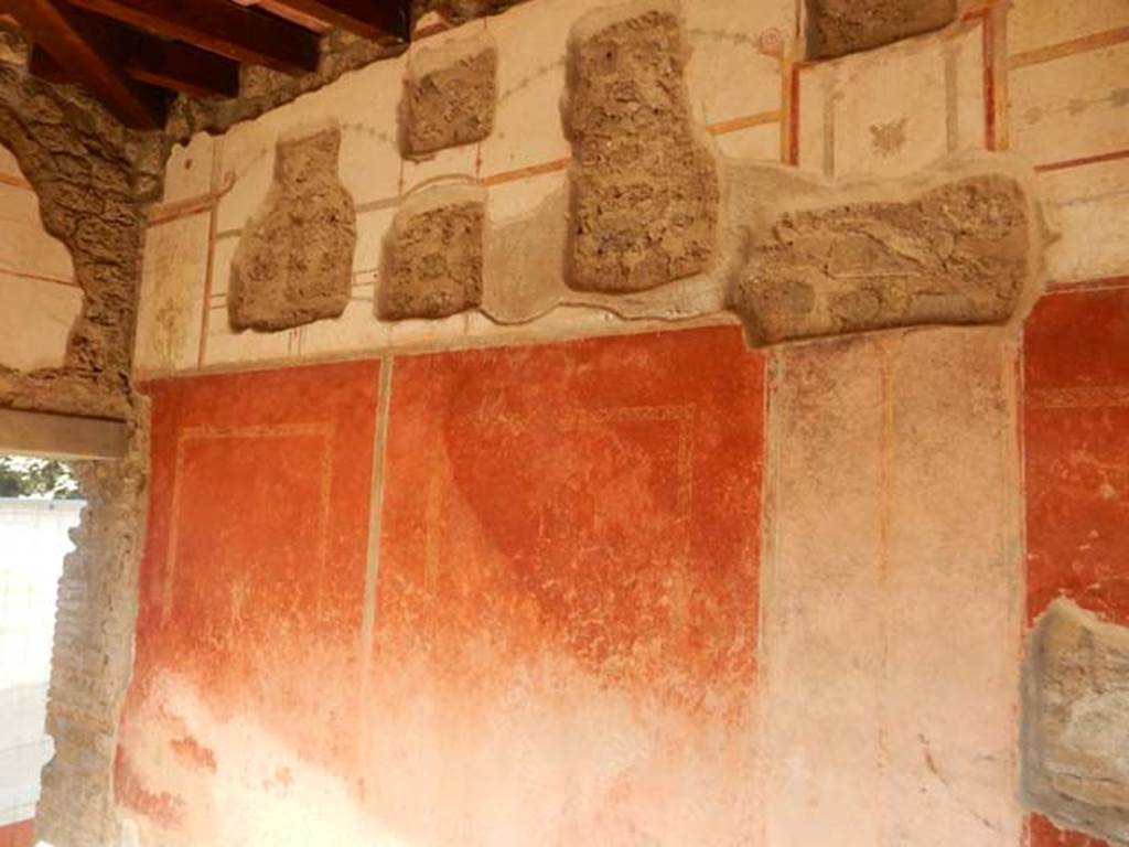 II.4.6 Pompeii. May 2017.  South wall in south-east corner, on left side of doorway to apodyterium.
Photo courtesy of Buzz Ferebee.
According to PPM, the vignettes and borders were systematically removed and taken away during the Bourbon period. 
See Carratelli, G. P., 1990-2003. Pompei: Pitture e Mosaici: Vol. III.  Roma: Istituto della enciclopedia italiana, p. 210. 
