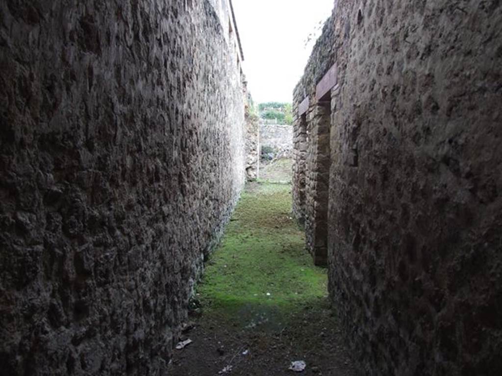 II.4.6 Pompeii. December 2006.   Looking north in corridor, with room with two doors to right