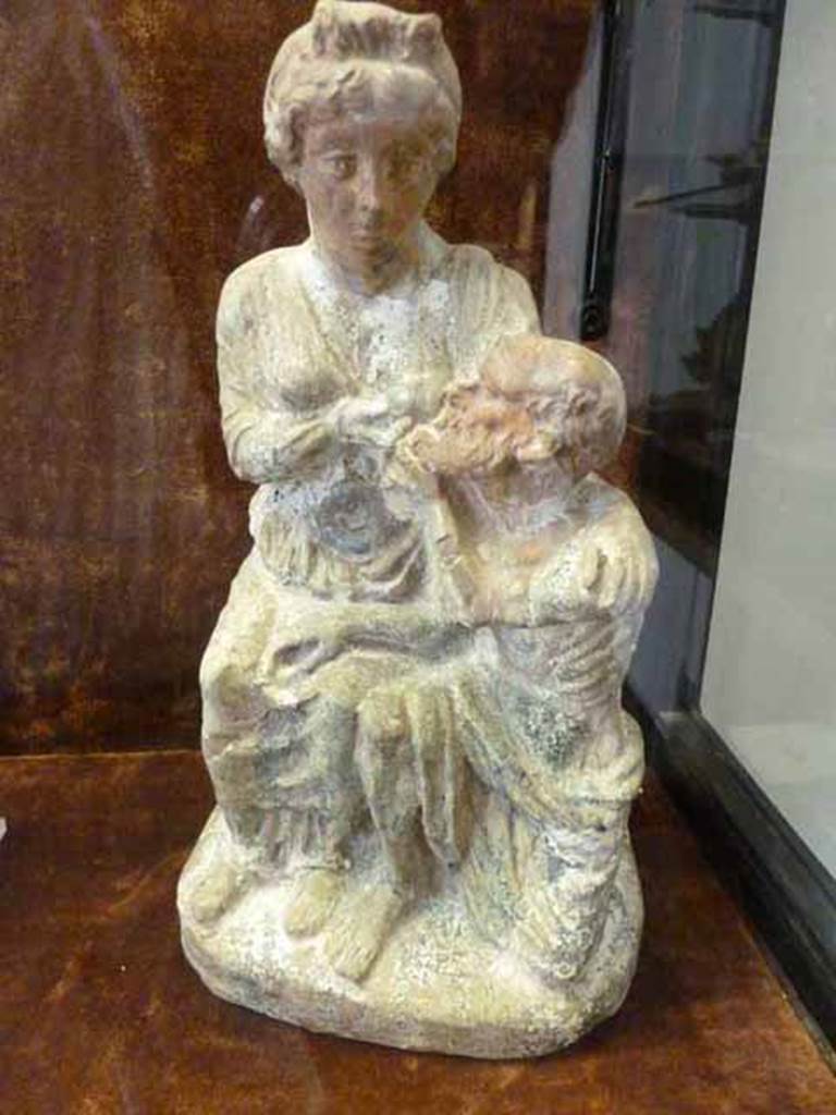 II.4.6 Pompeii. Found in several fragments in the garden. Terracotta statuette labelled “Gruppi figurati con Perona e Micone”. Now in Naples Archaeological Museum. This seems to match the illustration by Rohden of The Carita Romana or Roman Charity.
