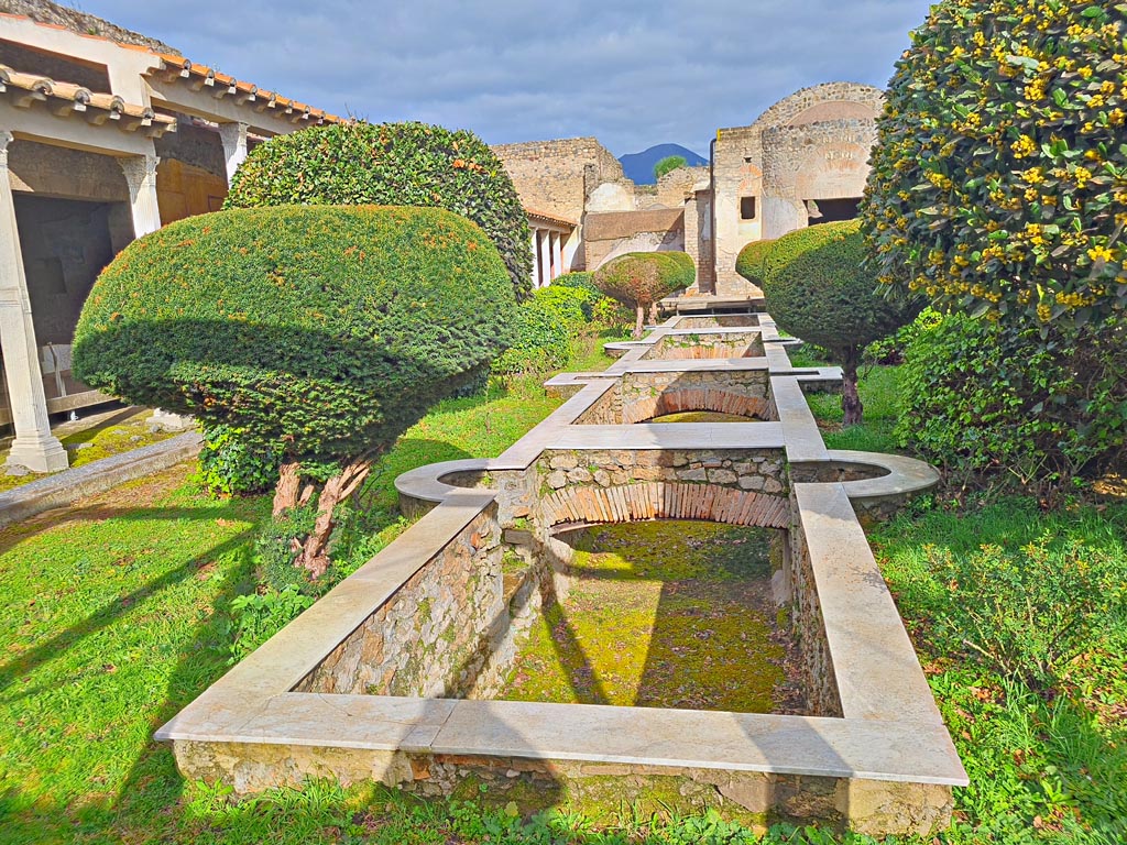 II.4.6 Pompeii. March 2024. Looking north across pool in garden area. Photo courtesy of Giuseppe Ciaramella.