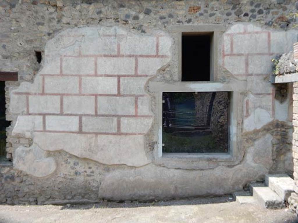 II.4.10 Pompeii. May 2016. Looking west towards exterior façade with window intobiclinium.  Photo courtesy of Buzz Ferebee.
