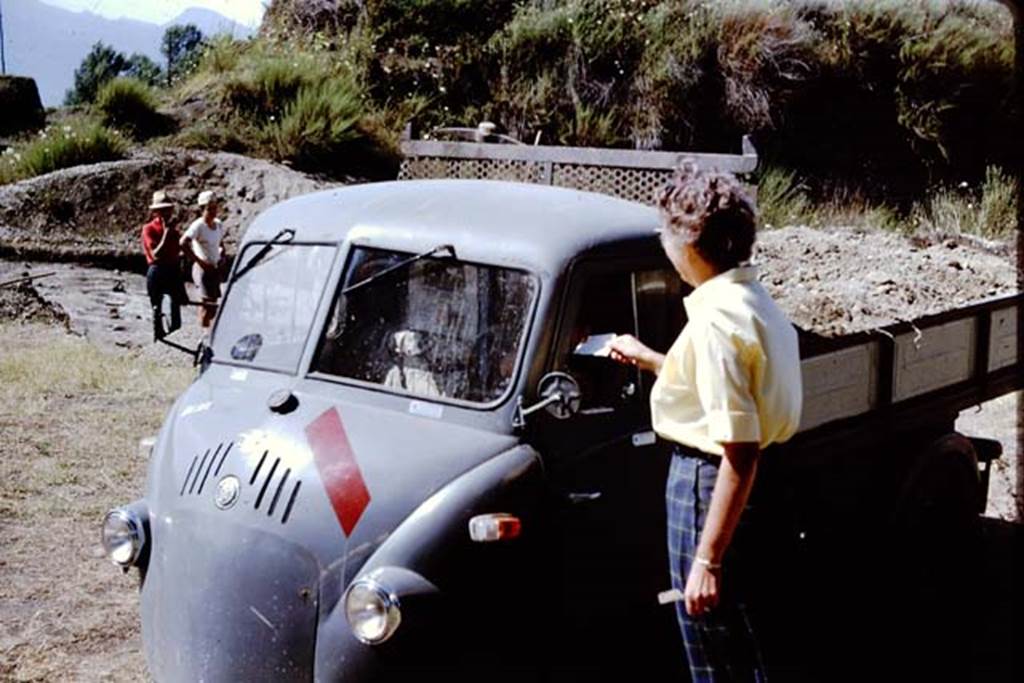 II.5 Pompeii. 1966. Wilhelmina giving a ticket to the truck driver. They got paid for the number of tickets they had worked for. Photo by Stanley A. Jashemski.
Source: The Wilhelmina and Stanley A. Jashemski archive in the University of Maryland Library, Special Collections (See collection page) and made available under the Creative Commons Attribution-Non Commercial License v.4. See Licence and use details.
J66f0767
