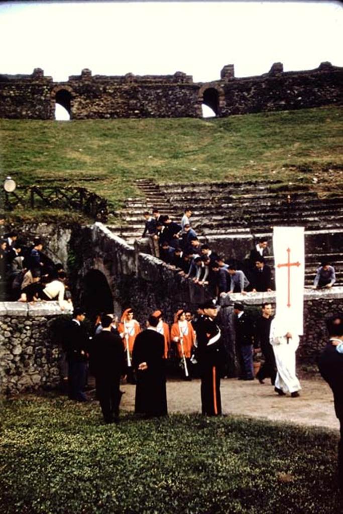 II.6 Pompeii. September 2024. 
Looking west across amphitheatre towards Gladiators in combat rehearsing.  
Photo courtesy of Giuseppe Ciaramella.
