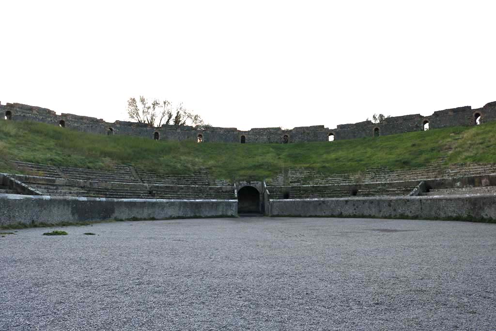 II.6 Pompeii. December 2018. Looking towards south end of arena and seating of amphitheatre. Photo courtesy of Aude Durand.