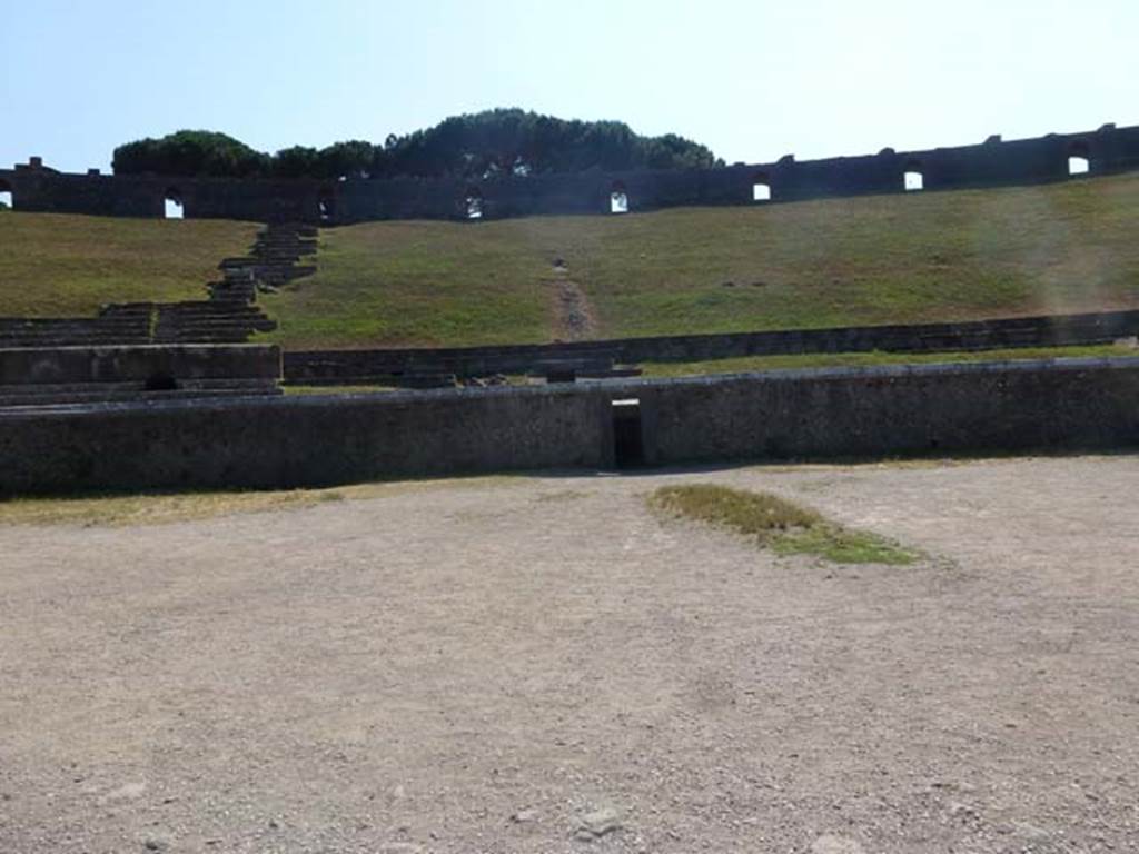 II.6 Pompeii. June 2012. Looking west across arena of Amphitheatre. Photo courtesy of Michael Binns.