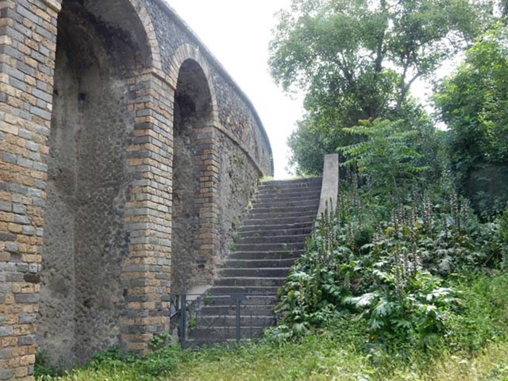 II.6 Pompeii, May 2018. Steps at south-west end of amphitheatre. Photo courtesy of Buzz Ferebee.

