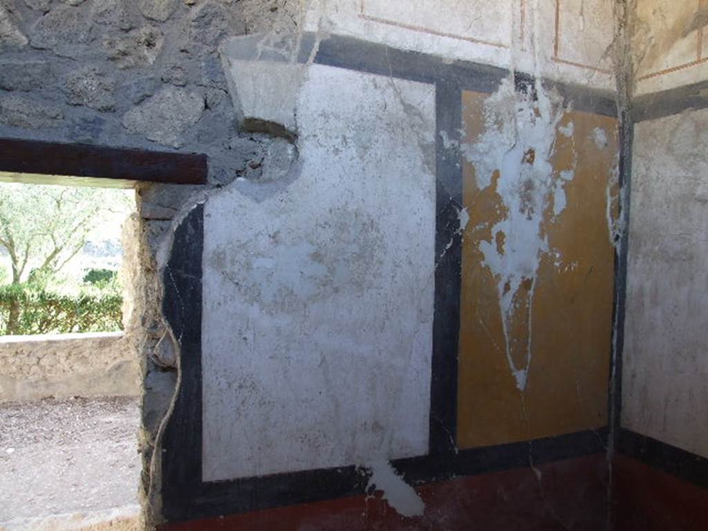 II.8.6 Pompeii December 2006. Doorway to corridor/garden area, and south wall.      