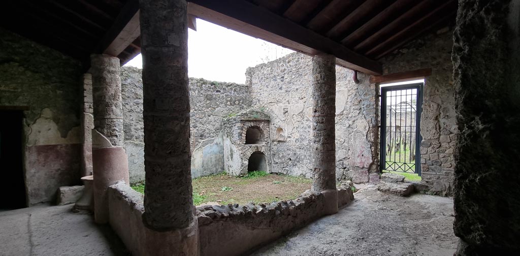 II.9.5 Pompeii, December 2023. 
Peristyle 6, looking west along south portico, from doorway of room 7. Photo courtesy of Miriam Colomer.
