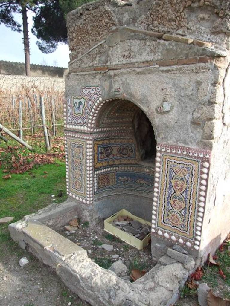 II.9.7. Garden entrance to House of Summer Triclinium.  December 2007.  Fountain or Nymphaeum on the south side.  North face.