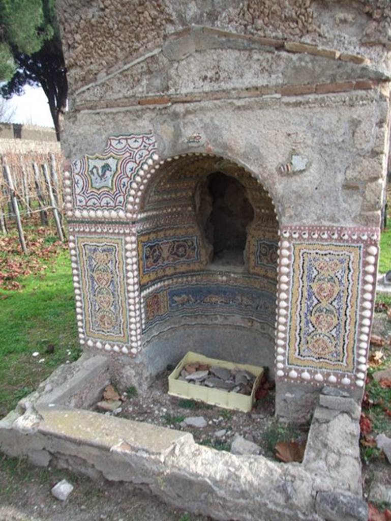 II.9.7. Garden entrance to House of Summer Triclinium.  December 2007.  Fountain or Nymphaeum on the south side.  North face.  Mosaic.