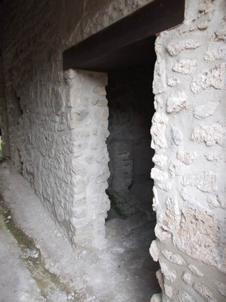 III.2.1 Pompeii.  March 2009.  Door to Room 11 on east side of corridor.  