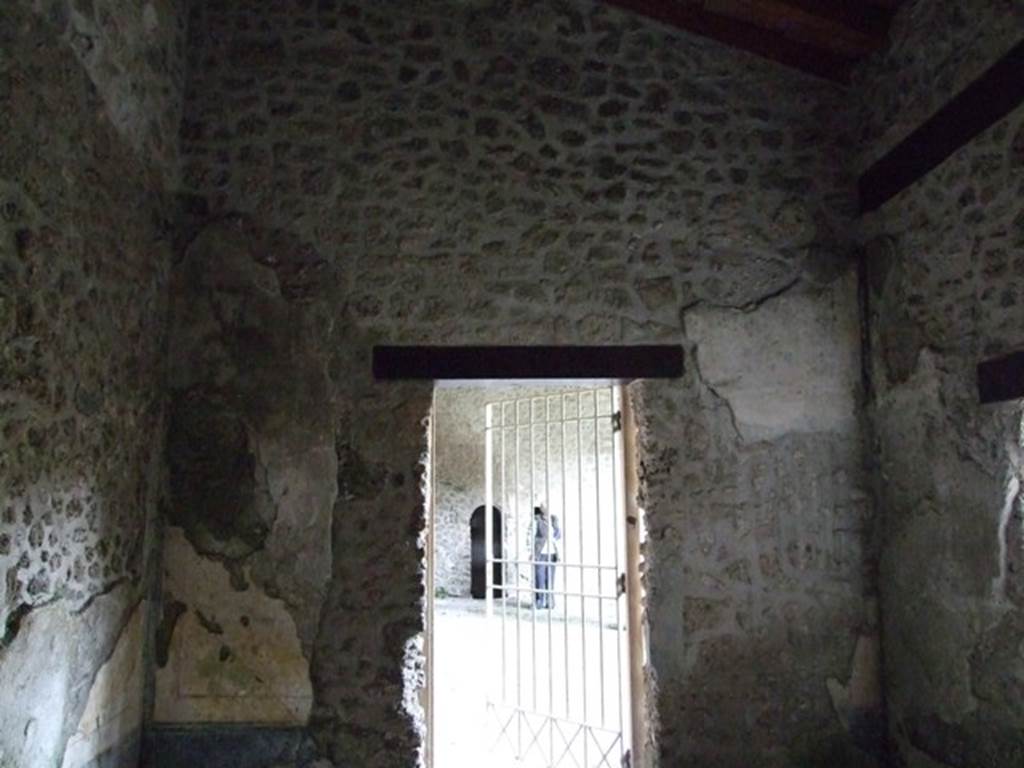 III.2.1 Pompeii.  March 2009.  Room 14. Triclinium.  South wall with door to portico.