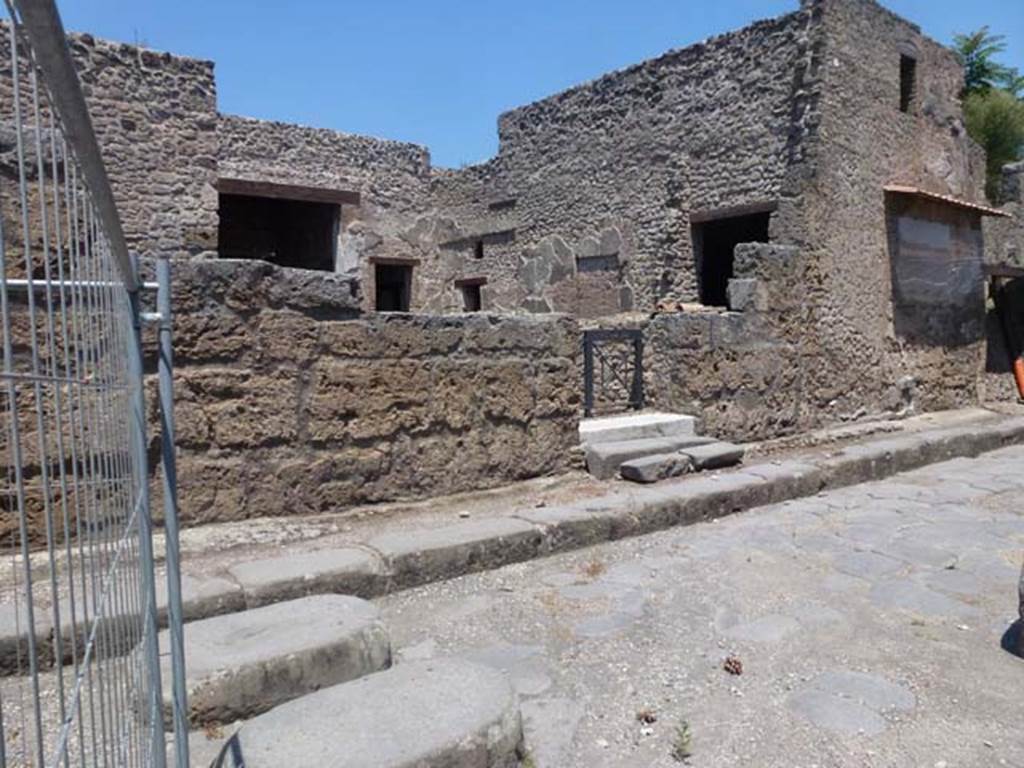 III.2.1 Pompeii, June 2012. Looking east along front façade on north side of Via dell’Abbondanza. Photo courtesy of Michael Binns.