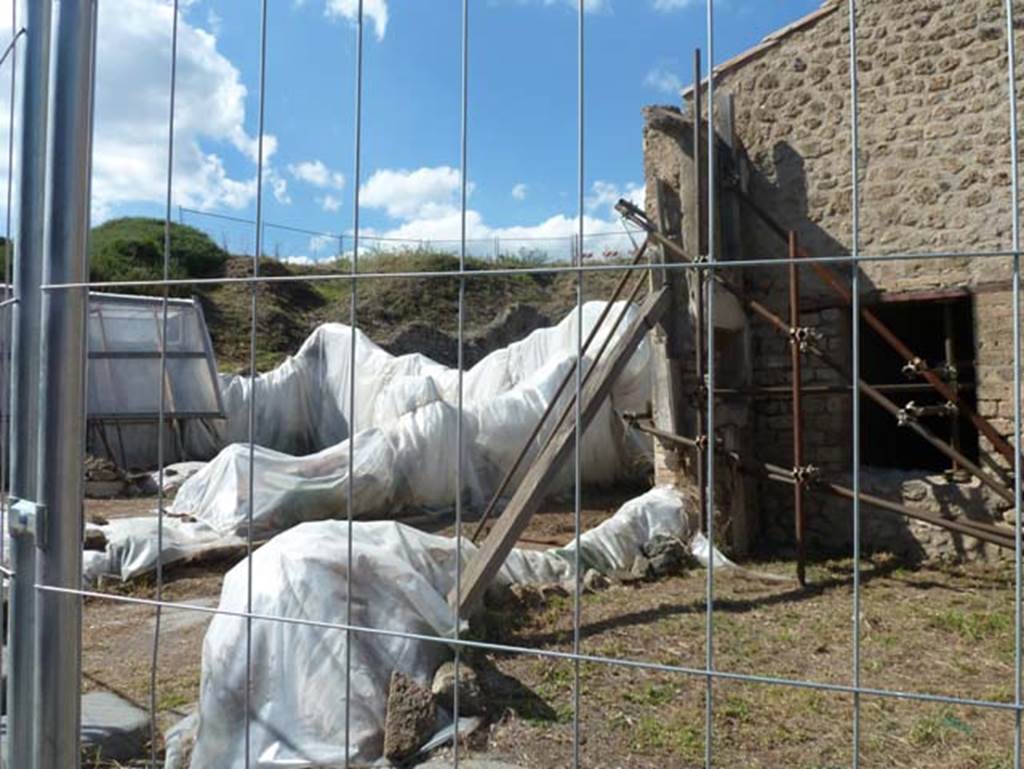 III.3.6 Pompeii. September 2015. Looking west from front of III.4.1, across Vicolo di Ifigenia towards the site of III.3.6, on left. 