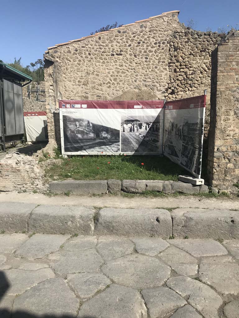 III.4.1 Pompeii, on right. Vicolo di Ifigenia, on left. April 2019. Looking north towards entrance threshold. 
The west wall, on left, has not been restored. Photo courtesy of Rick Bauer.
