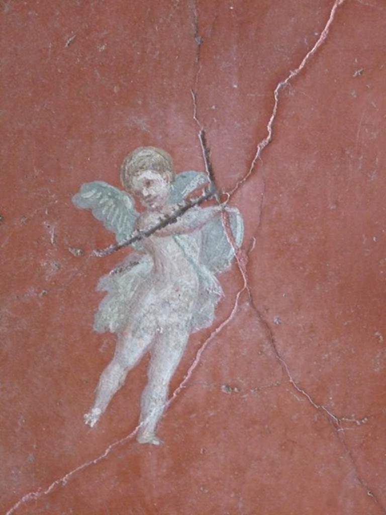 III.4.b. Pompeii.  March 2009. Room 4.  Exedra.  East wall.  Floating cupid .