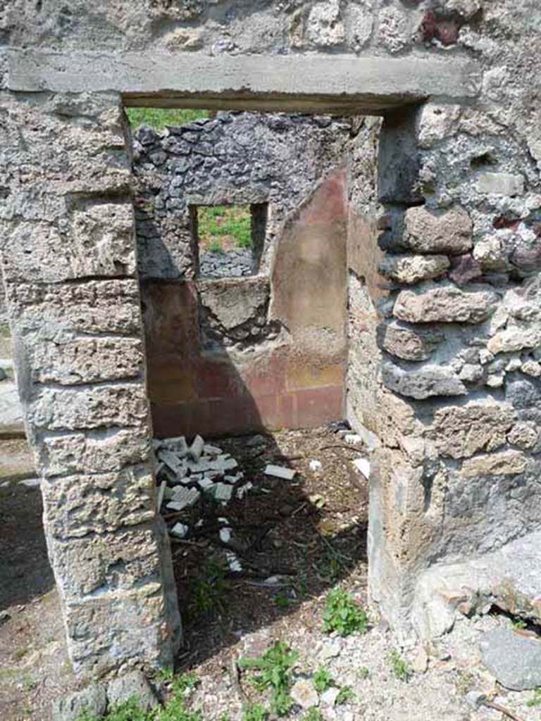 III.8.4 Pompeii. May 2010.  Doorway to small room on east side of entrance corridor.