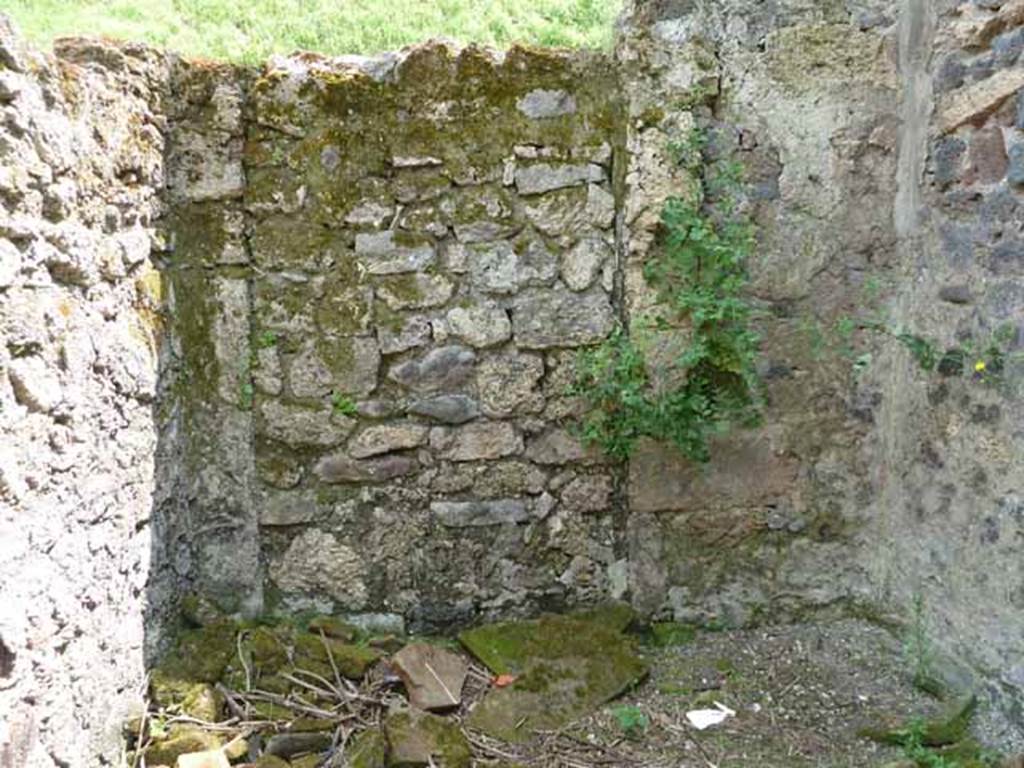 III.8.5 Pompeii. May 2010. South wall with blocked doorway.