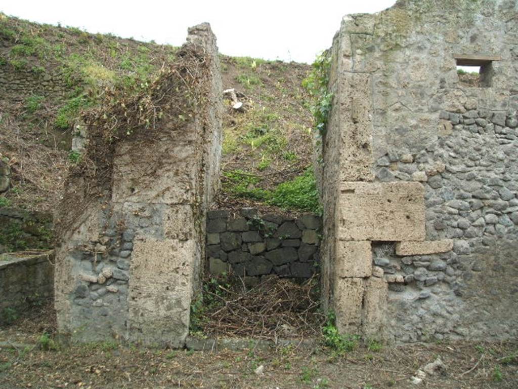 III.8.7 Pompeii. May 2005. Entrance (now blocked) leading to the atrium.