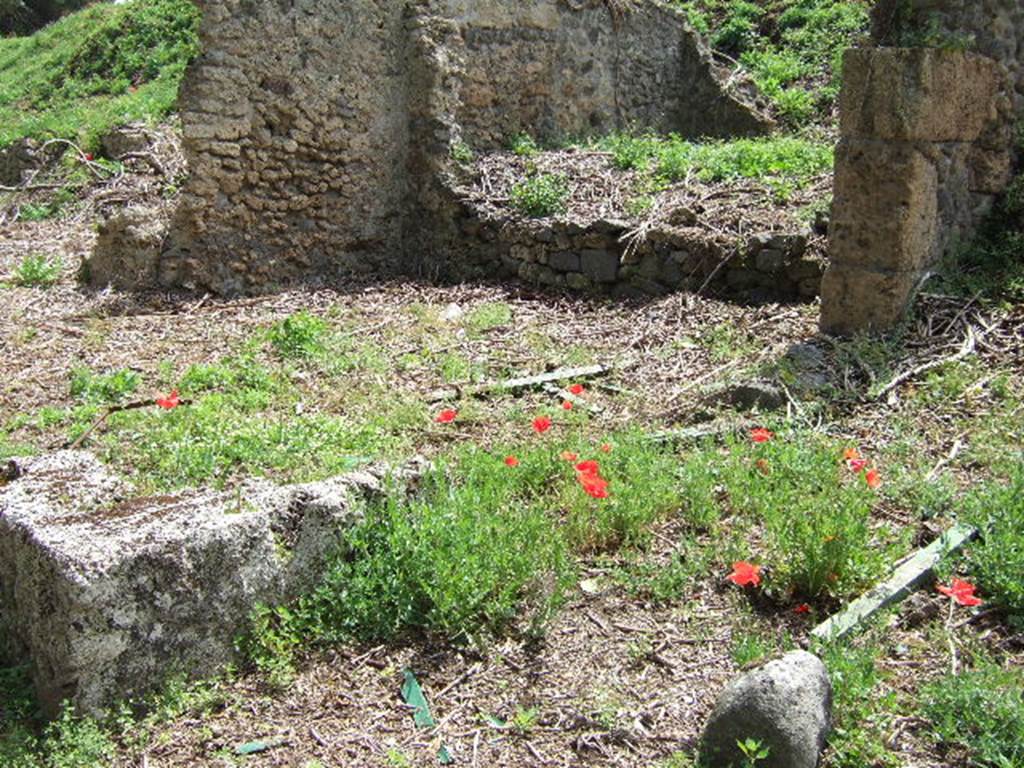 III.11.1 Pompeii. May 2006. Looking east from side street, through doorway at III.11.a.