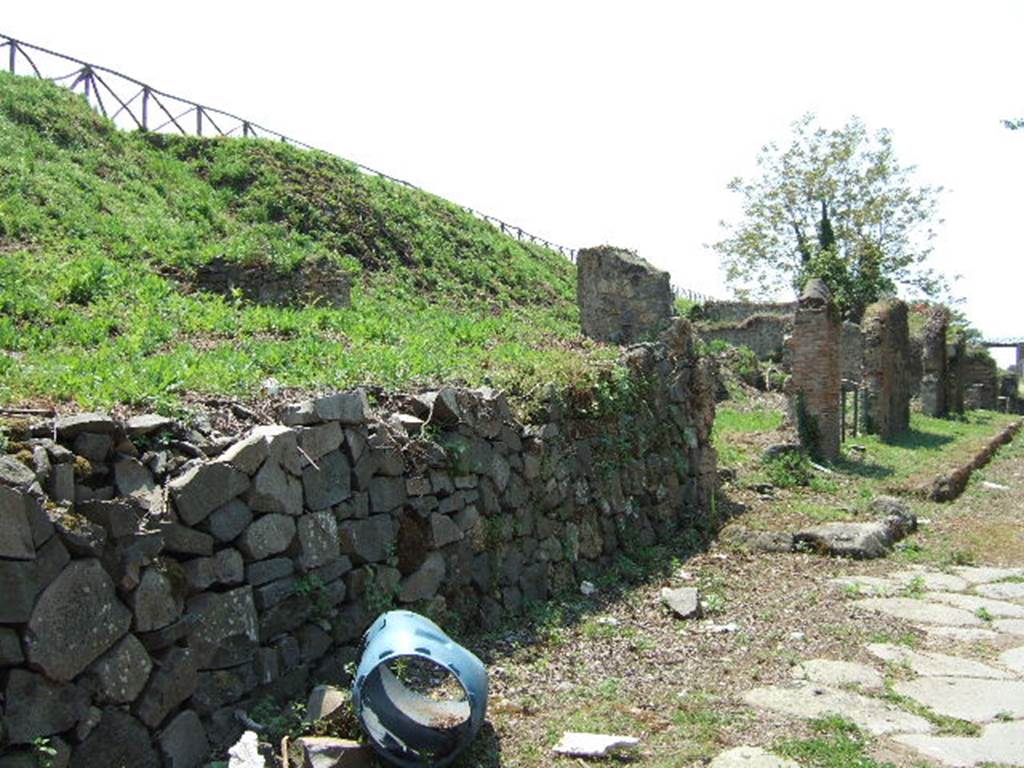 Pompeii.  May 2006. III.12.a (left) looking west from Nola Gate