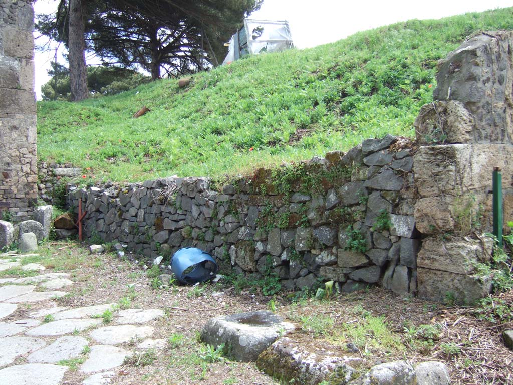 Pompeii. May 2006. Site of III.12.a, III.12.b and blocked road  