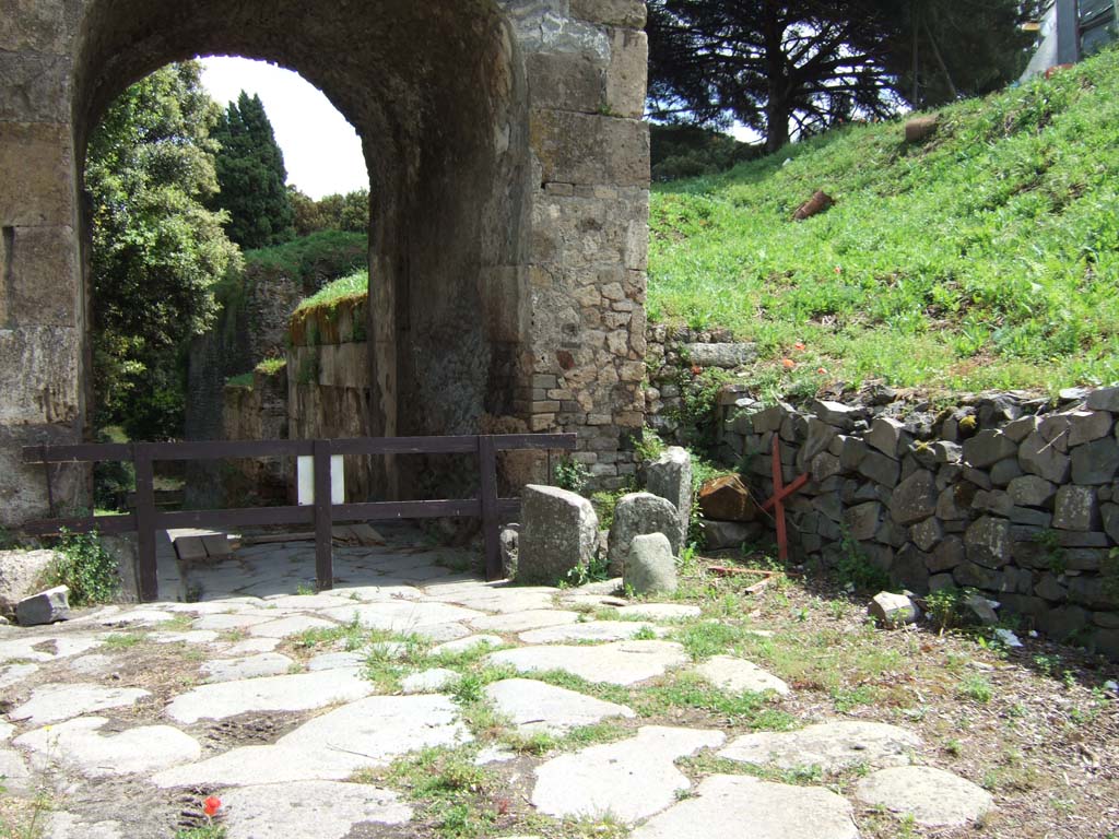 Pompeii. May 2006. Nola Gate and III.12.a. Looking east.