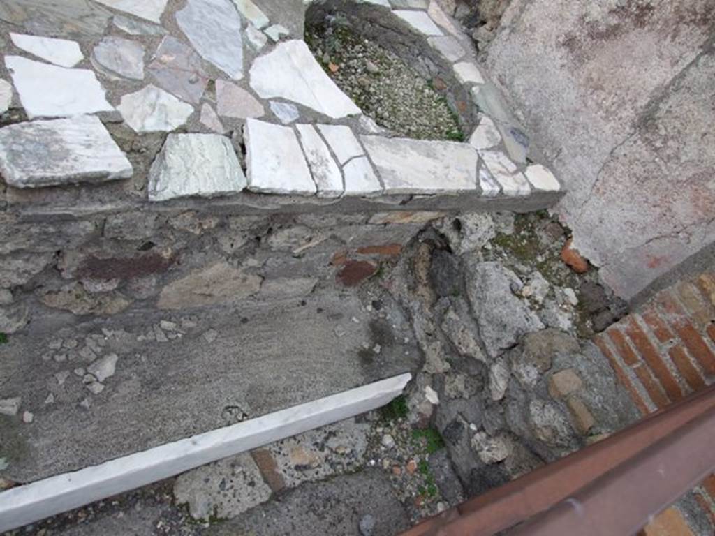 V.1.1 Pompeii. December 2007. South-east corner of marble counter and entrance doorway.